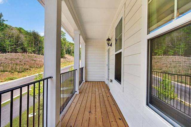 2534 Harbor Rdg Pass, Unit 344 Gainesville, GA 30507 - Photo 3 of 28 a view of a balcony with wooden floor