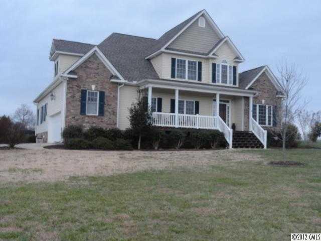 1137 Crossland Road Clover, SC 29710 - Photo 1 of 16 a front view of a house with a yard