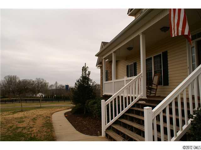 1137 Crossland Road Clover, SC 29710 - Photo 2 of 16 a view of a house with backyard and deck