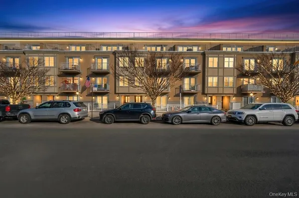 a view of a cars parked in front of a building