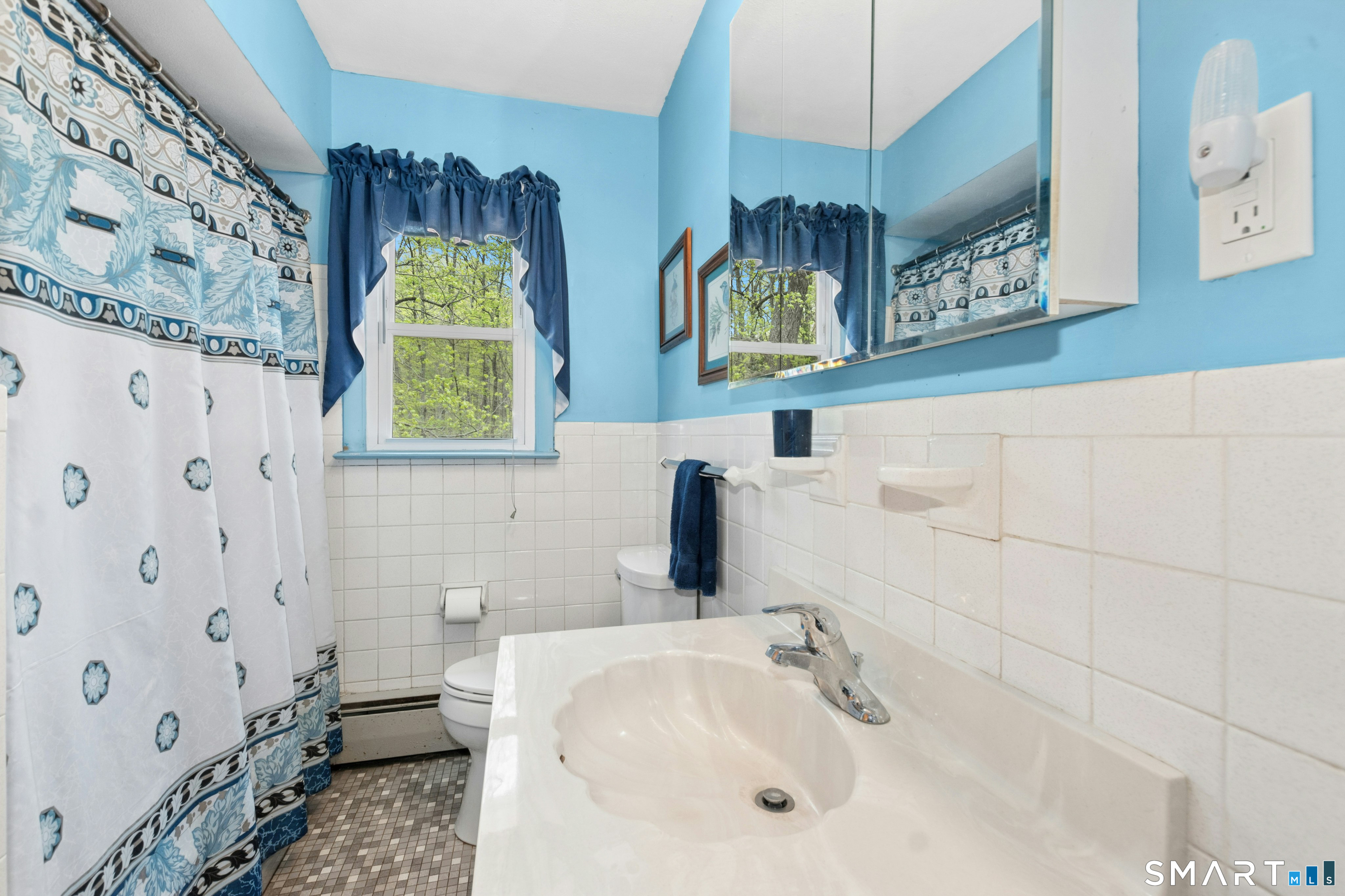 15 Limestone Terrace Ridgefield, CT 06877 - Photo 19 of 32 a bathroom with double vanity sink and a mirror