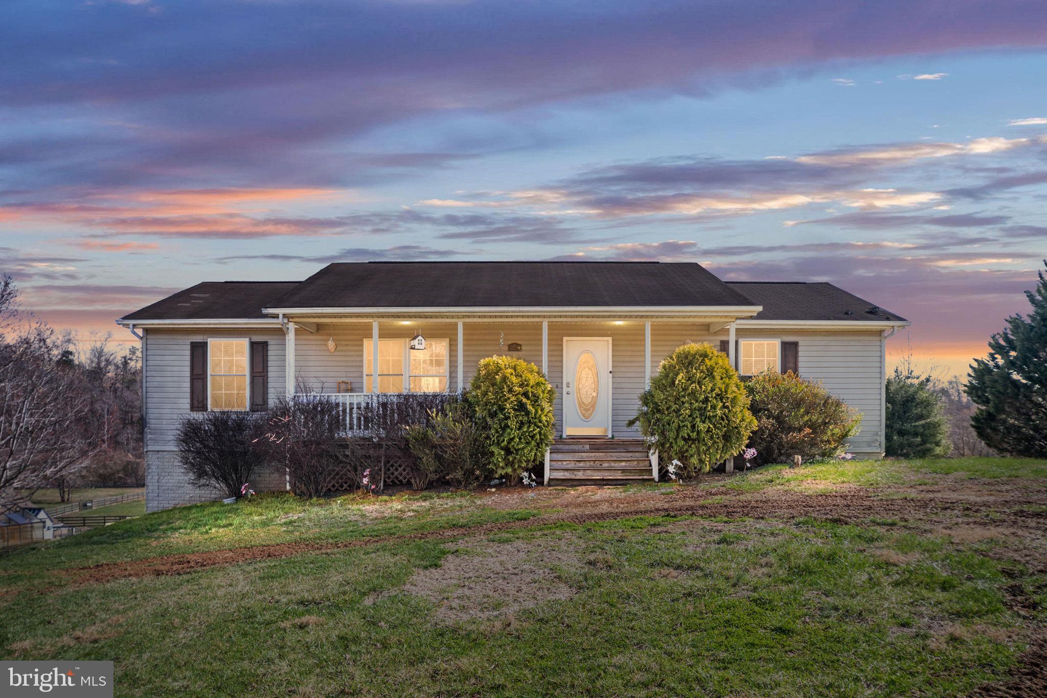 7541 Eggbornsville Road Rixeyville, VA 22737 - Photo 2 of 61 a front view of a house with garden