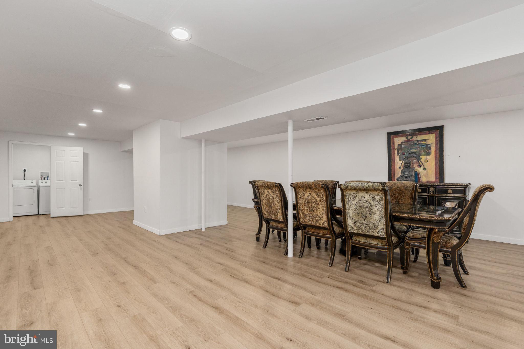 7541 Eggbornsville Road Rixeyville, VA 22737 - Photo 28 of 61 a view of a dining room with furniture and wooden floor