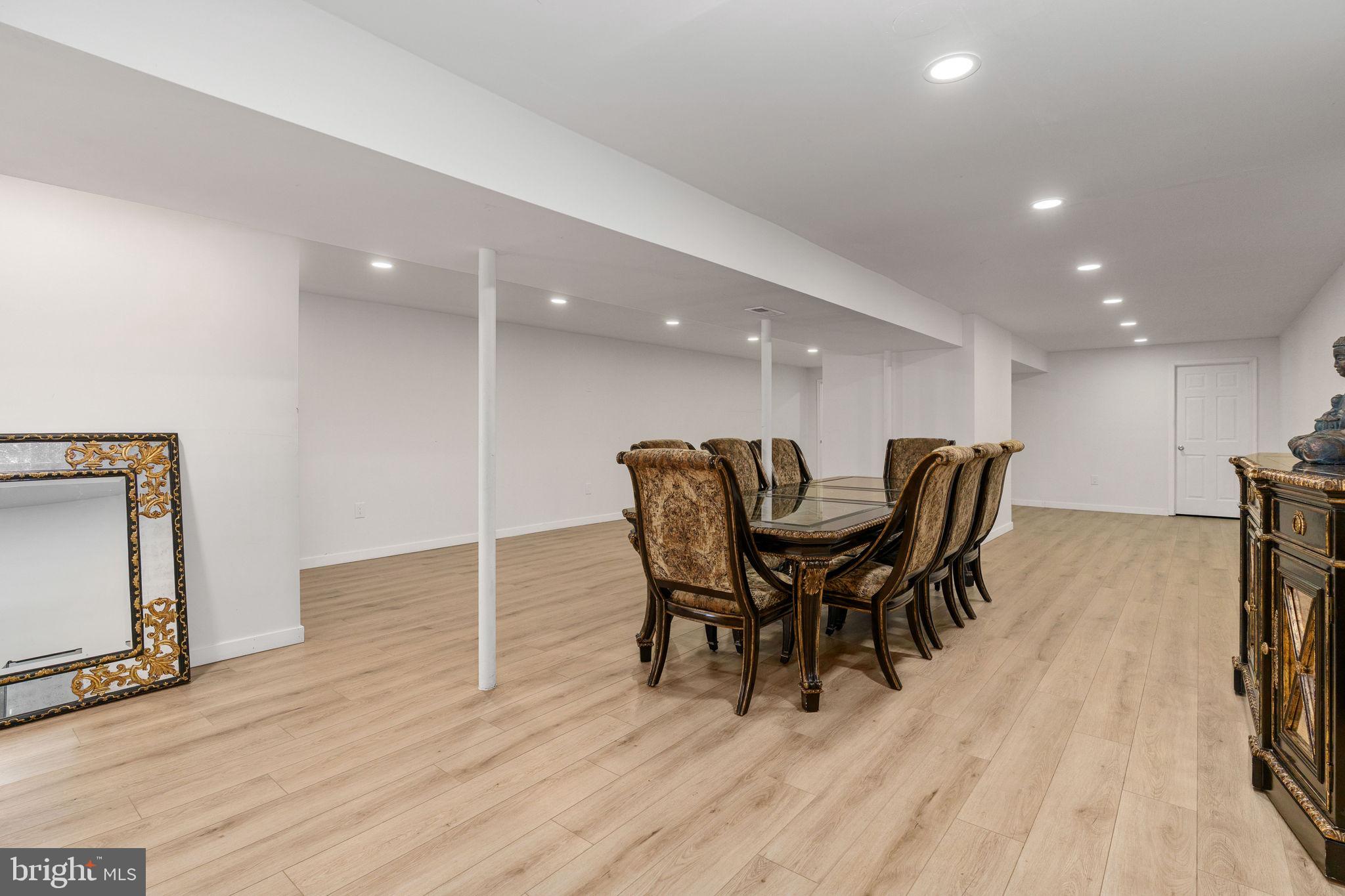 7541 Eggbornsville Road Rixeyville, VA 22737 - Photo 29 of 61 a view of a dining room with furniture and wooden floor