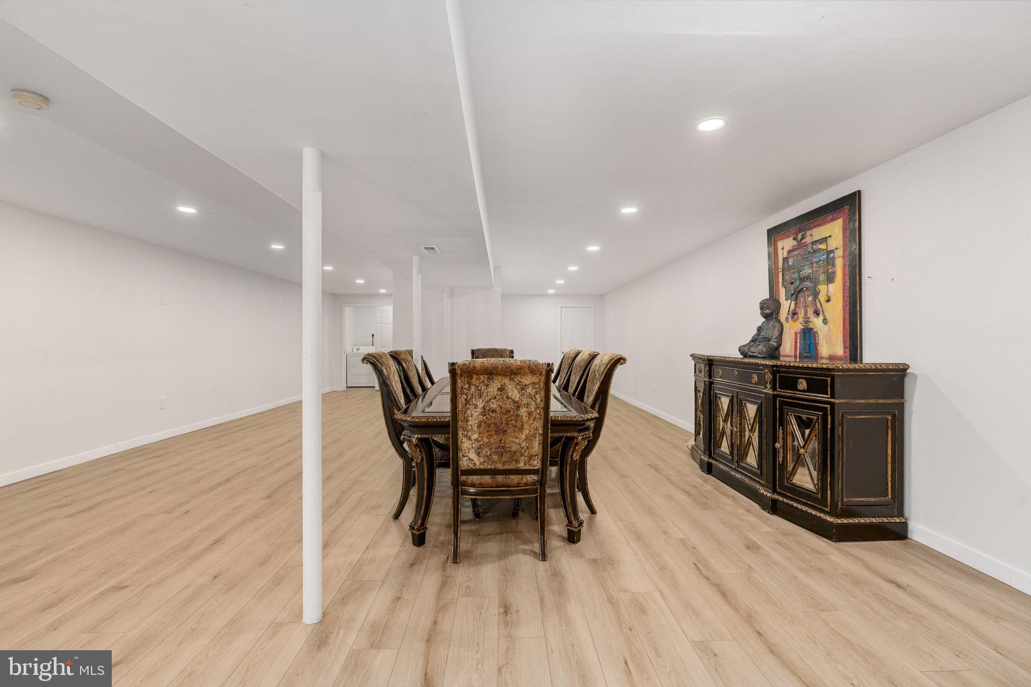 7541 Eggbornsville Road Rixeyville, VA 22737 - Photo 30 of 61 a view of a dining room with furniture and wooden floor