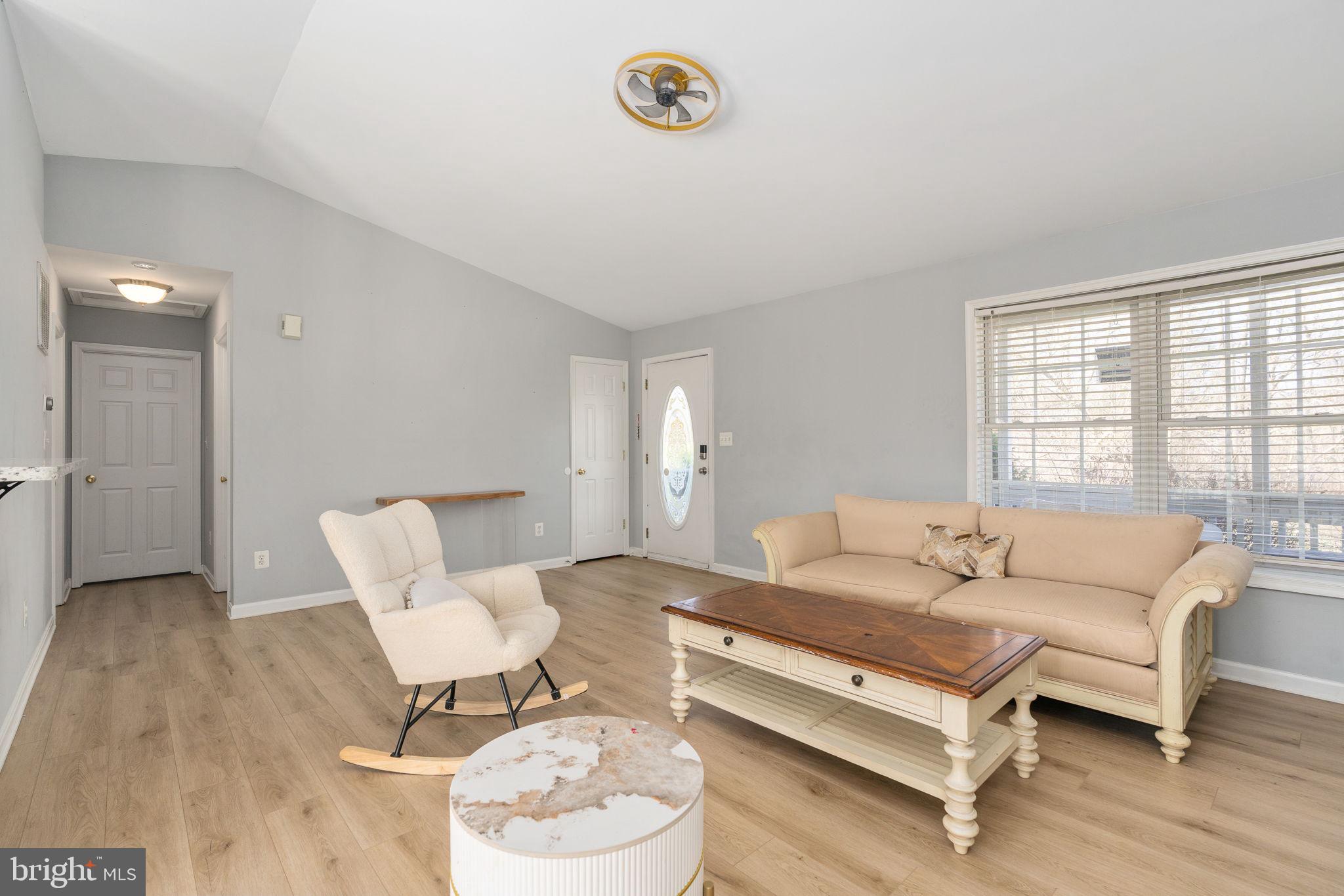 7541 Eggbornsville Road Rixeyville, VA 22737 - Photo 7 of 61 a living room with furniture and a window