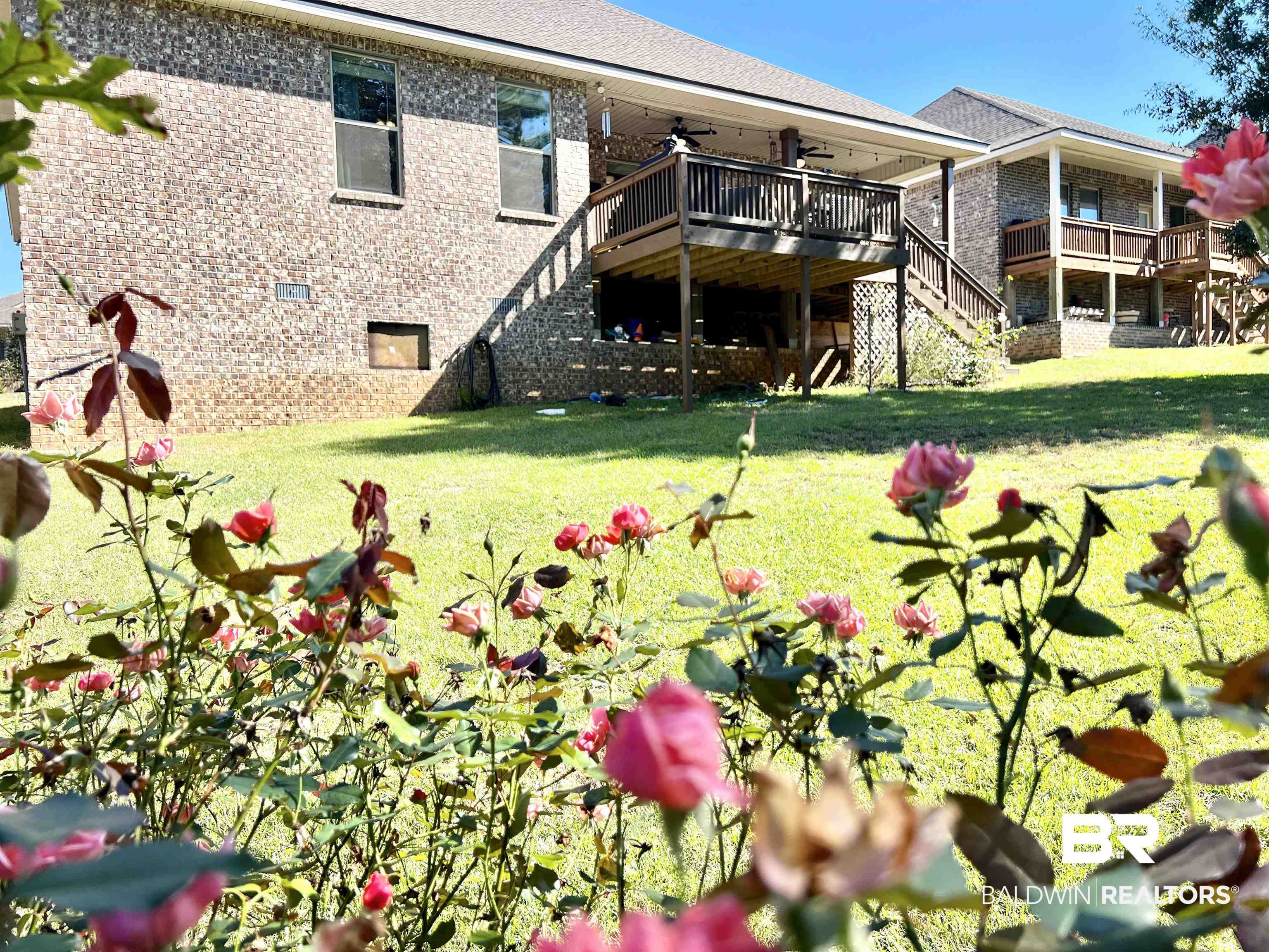 32290 Calder Court Daphne, AL 36527 - Photo 58 of 59 View of yard featuring a wooden deck