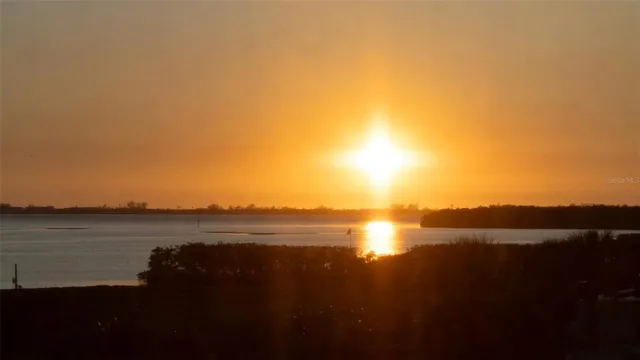a view of an ocean with beach