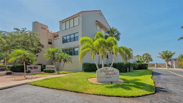 a vase with flowers and trees