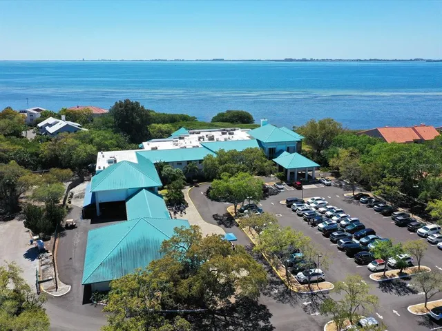 an aerial view of a house with a garden
