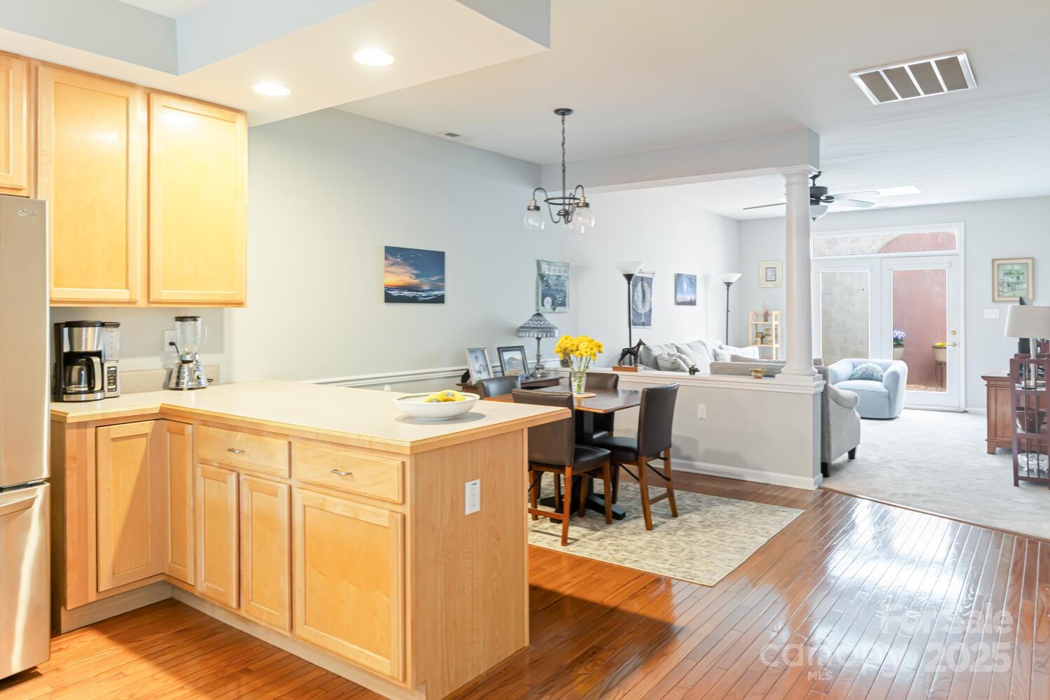 121 Shadowbrook Drive Asheville, NC 28805 - Photo 14 of 32 a view of kitchen and dining room with wooden floor