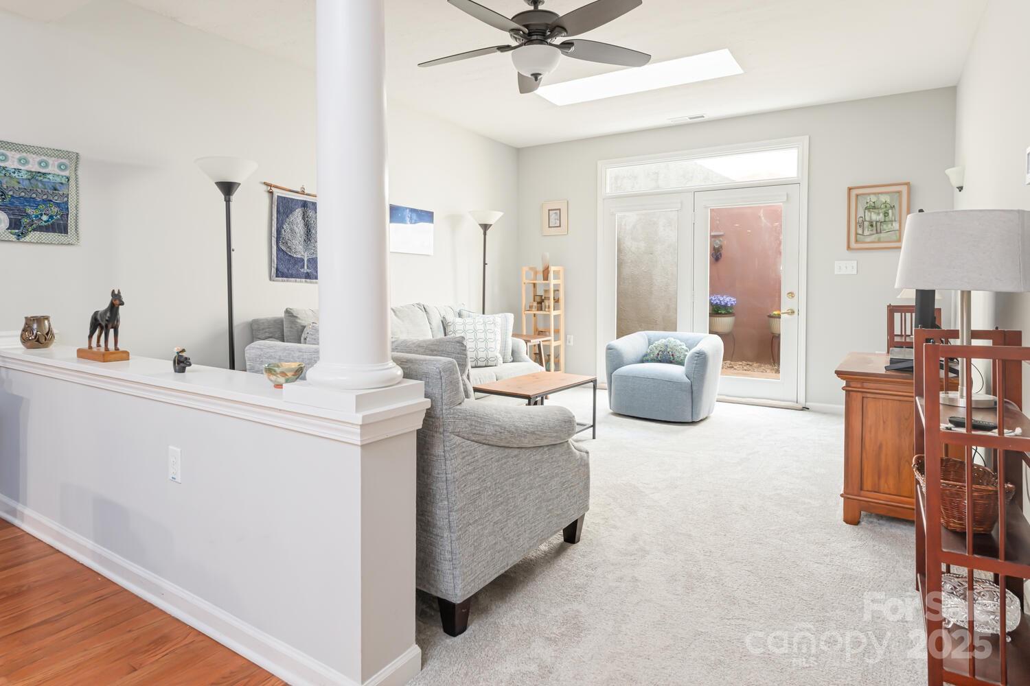 121 Shadowbrook Drive Asheville, NC 28805 - Photo 16 of 32 a living room with furniture and white walls