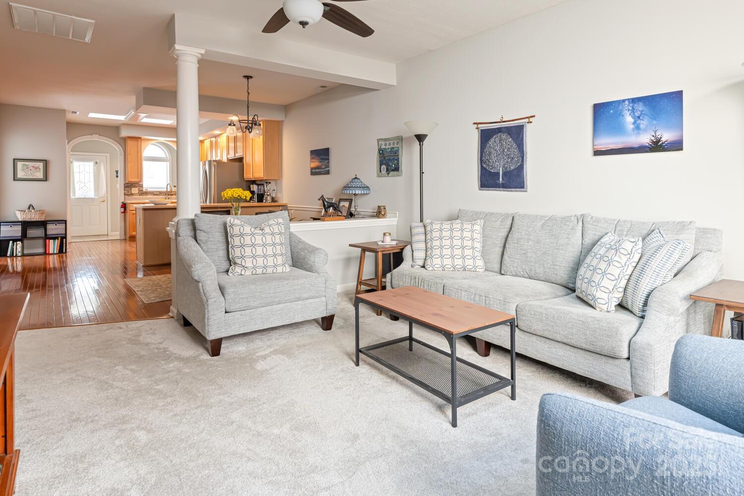 121 Shadowbrook Drive Asheville, NC 28805 - Photo 19 of 32 a living room with furniture and a large window