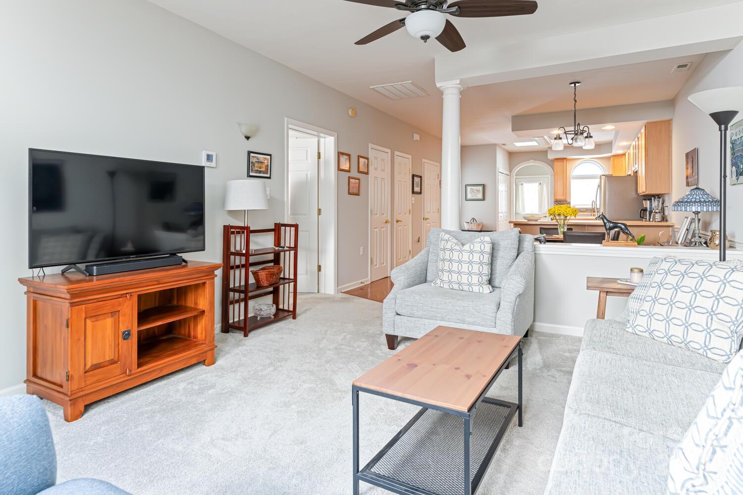 121 Shadowbrook Drive Asheville, NC 28805 - Photo 20 of 32 a living room with furniture and a flat screen tv