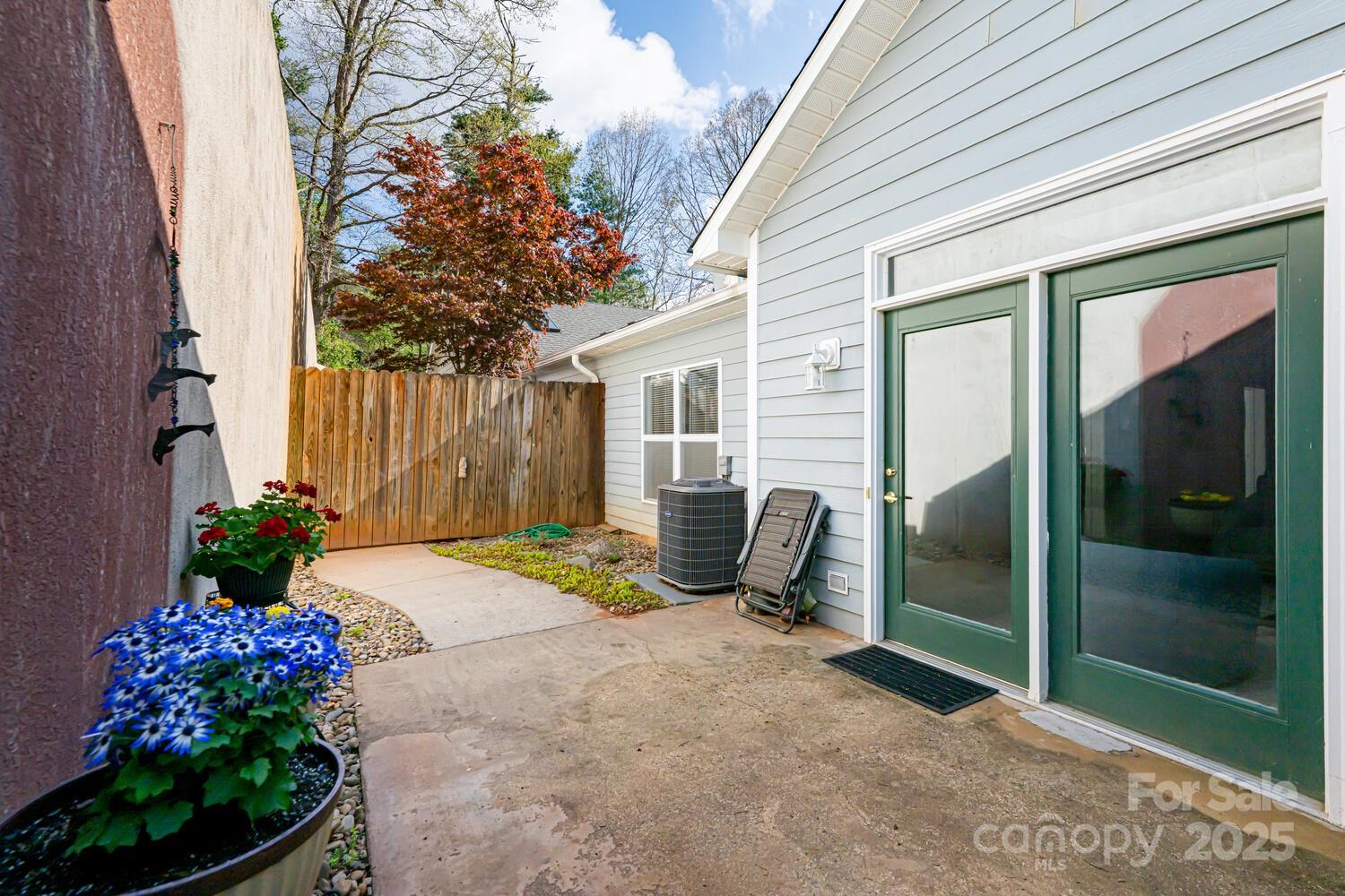 121 Shadowbrook Drive Asheville, NC 28805 - Photo 28 of 32 a view of backyard with seating space and garden