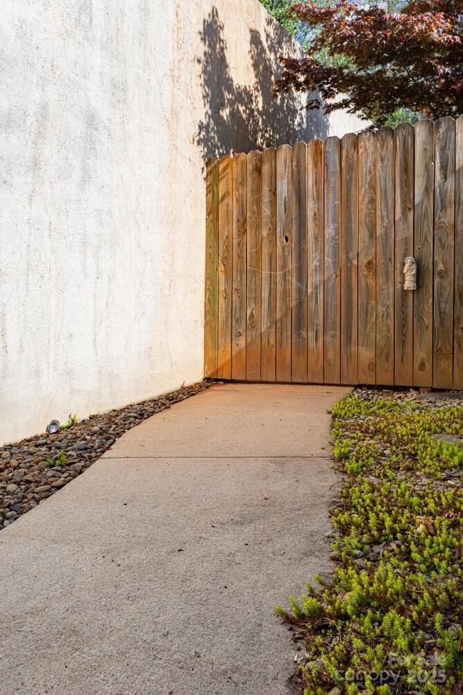 121 Shadowbrook Drive Asheville, NC 28805 - Photo 29 of 32 a view of a backyard with wooden fence