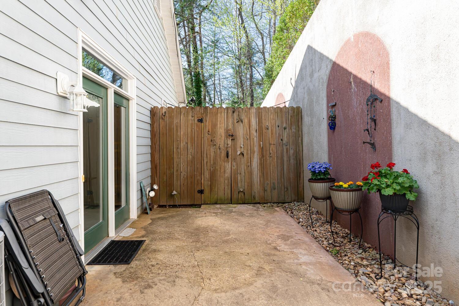 121 Shadowbrook Drive Asheville, NC 28805 - Photo 30 of 32 a view of a potted plants in front of a house