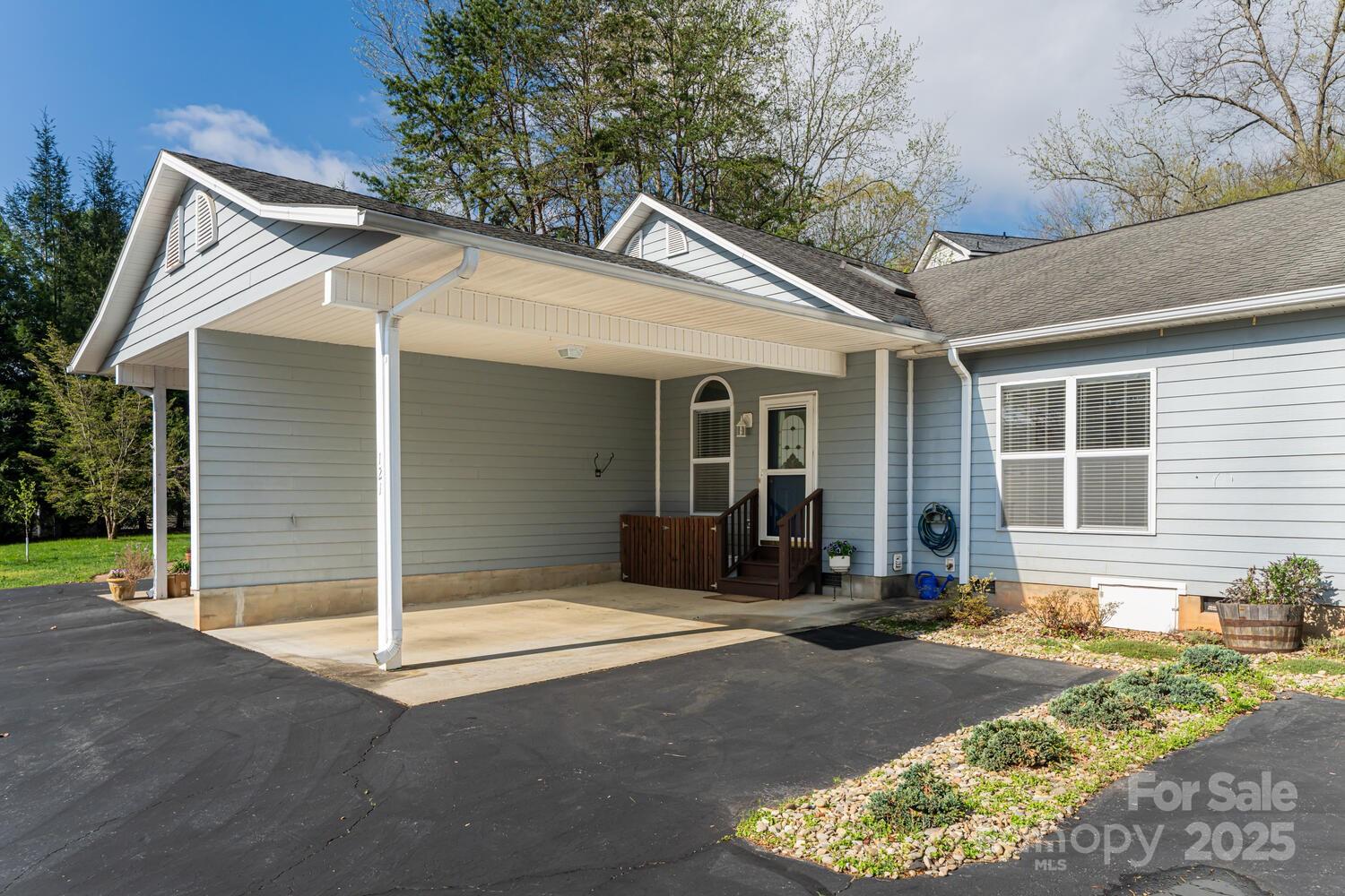 121 Shadowbrook Drive Asheville, NC 28805 - Photo 5 of 32 a view of a house with backyard
