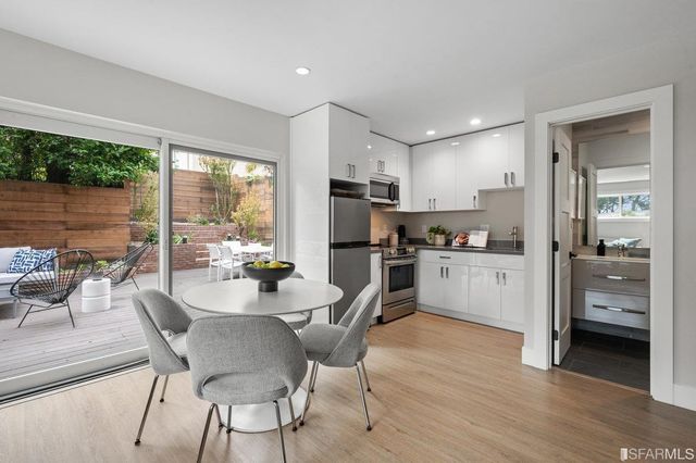 a view of a outdoor seating area with furniture