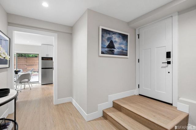 a front view of a house with a garage