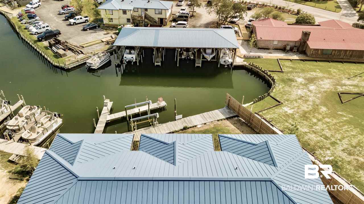 27152 Marina Road, Unit B Orange Beach, AL 36561 - Photo 4 of 37 Located in Canal Behind Tacky Jacks