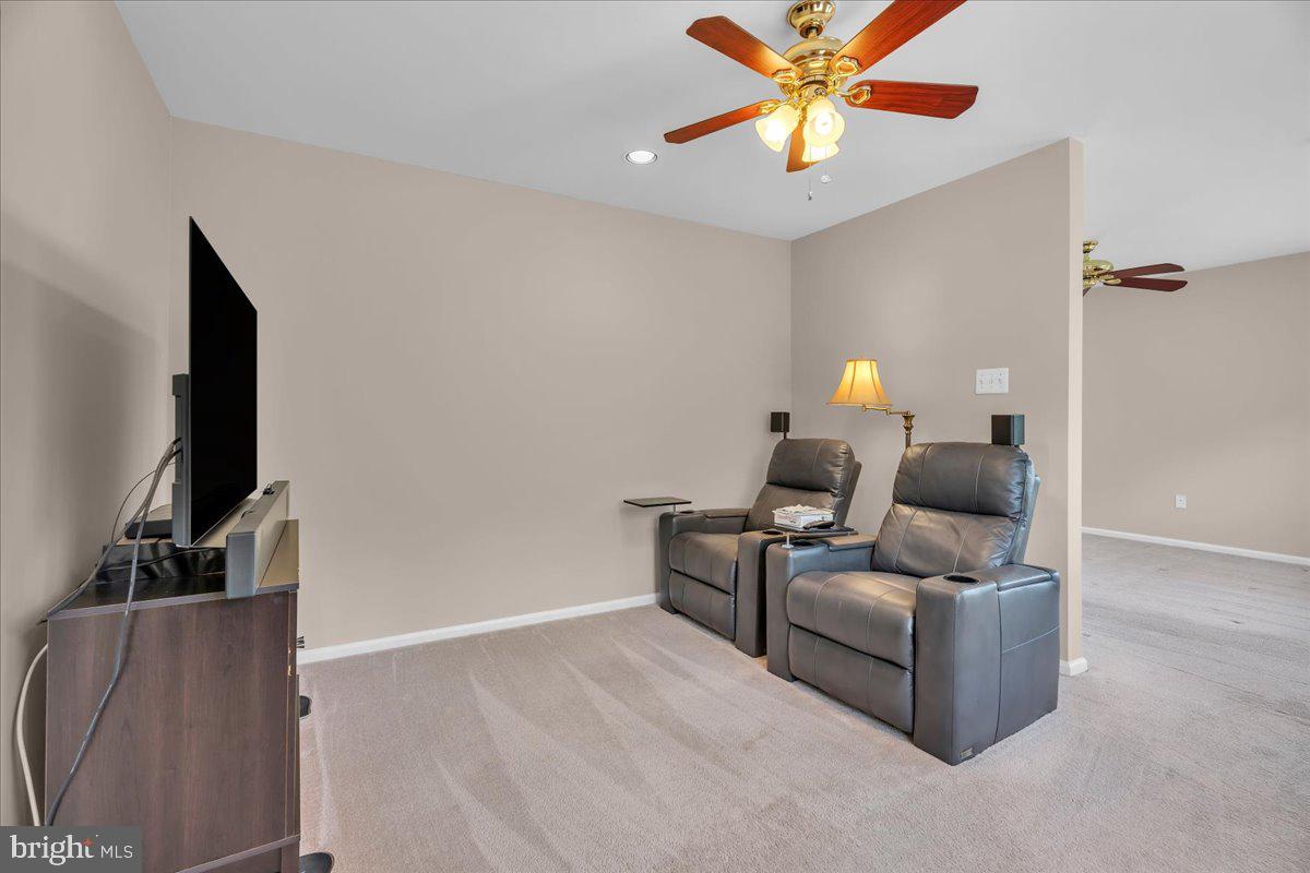 68 Hillside Lane Mount Laurel, NJ 08054 - Photo 25 of 36 a living room with furniture and a flat screen tv