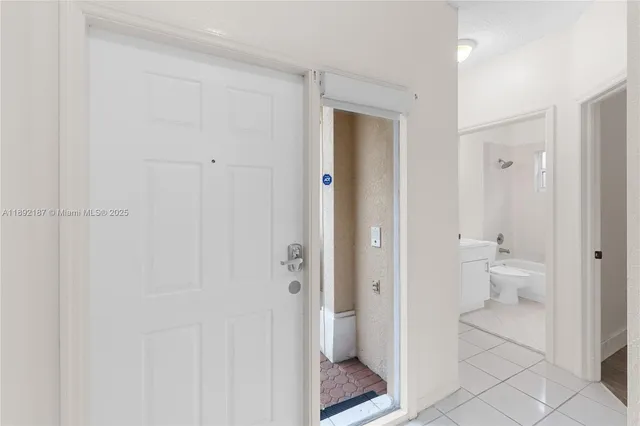 a bathroom view of a toilet and a sink