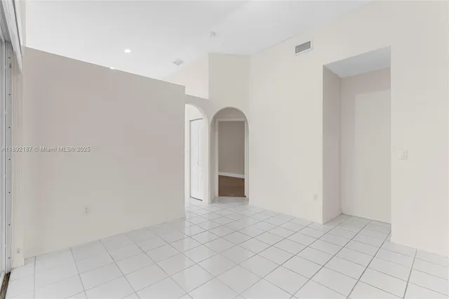 a view of an empty room with window