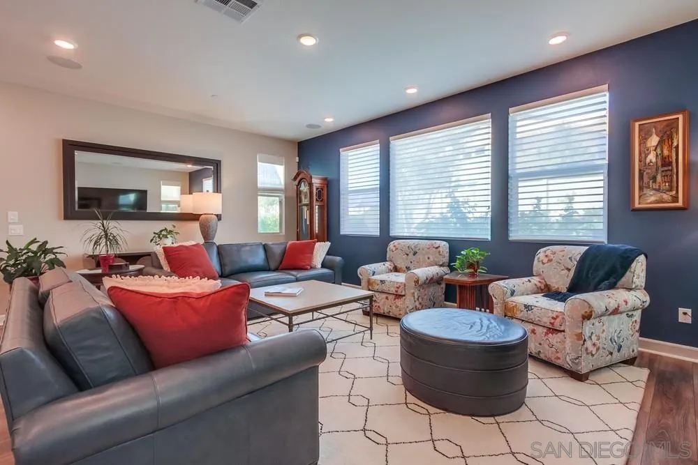 1933 Pascal Court Escondido, CA 92026 - Photo 18 of 52 a living room with furniture and a flat screen tv