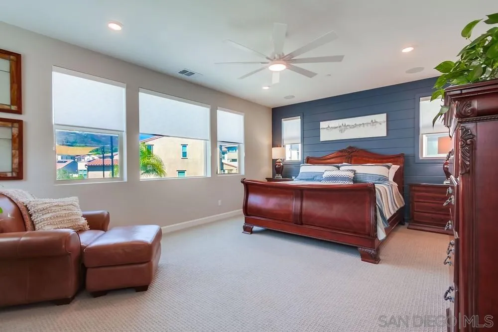 1933 Pascal Court Escondido, CA 92026 - Photo 22 of 52 a bedroom with furniture and windows