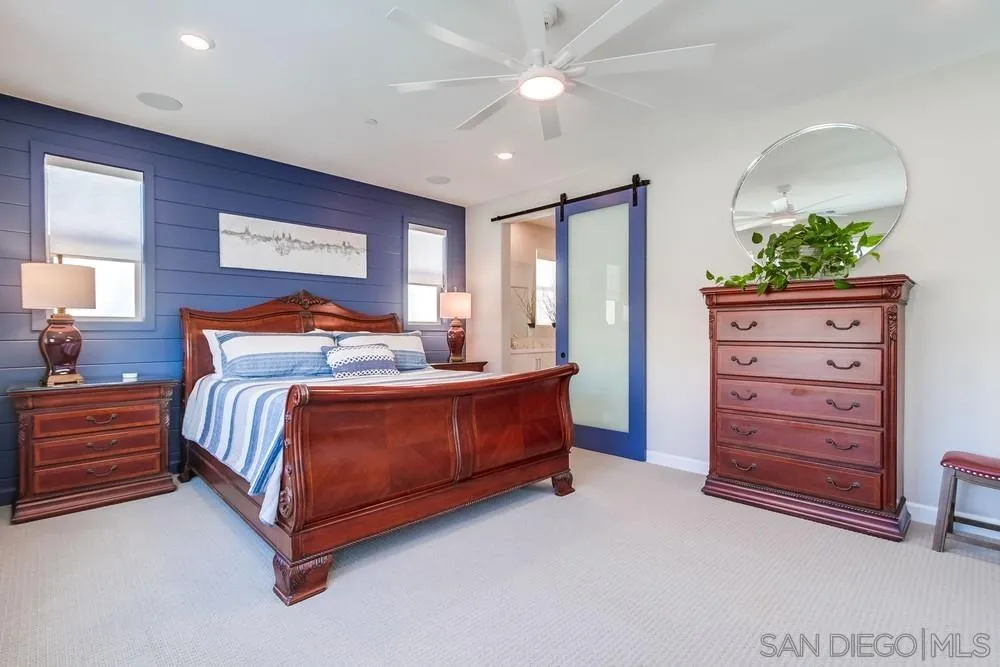 1933 Pascal Court Escondido, CA 92026 - Photo 23 of 52 a bedroom with a bed and a dresser