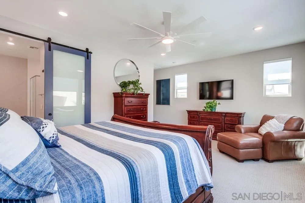 1933 Pascal Court Escondido, CA 92026 - Photo 24 of 52 a bedroom with furniture a bed and a mirror