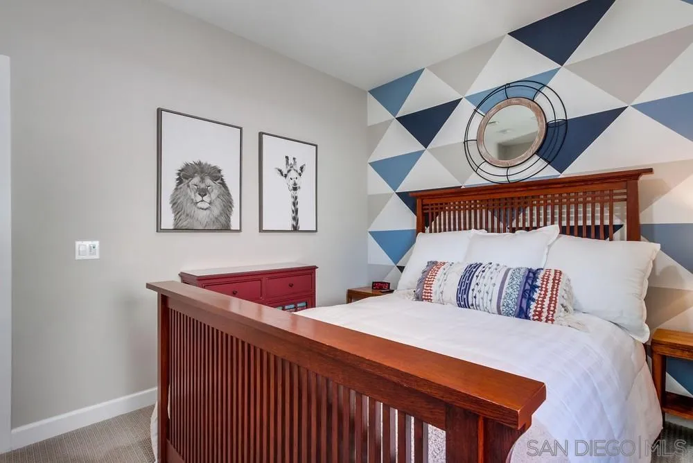 1933 Pascal Court Escondido, CA 92026 - Photo 31 of 52 a bedroom with a bed and a large window