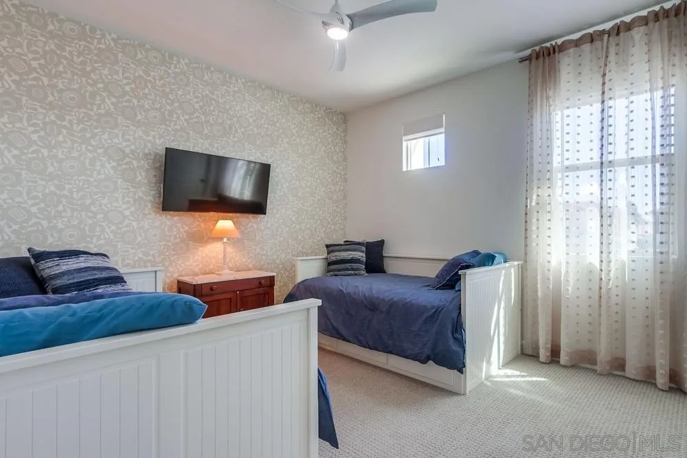 1933 Pascal Court Escondido, CA 92026 - Photo 33 of 52 a living room with furniture and a flat screen tv