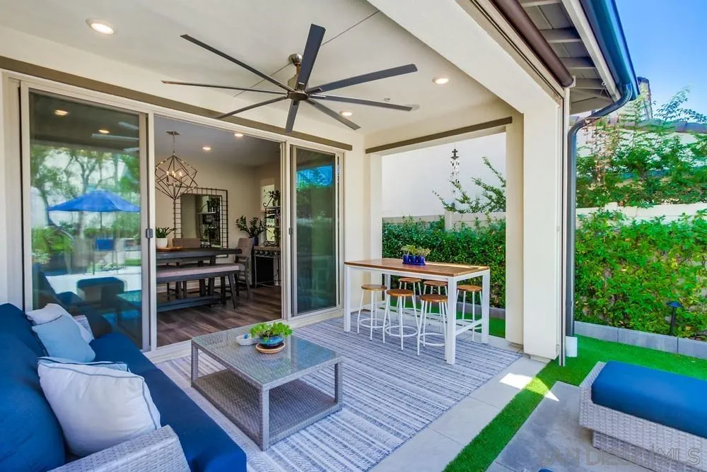 1933 Pascal Court Escondido, CA 92026 - Photo 44 of 52 a living room with patio furniture and a wooden floor