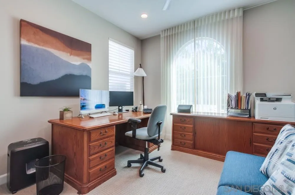 1933 Pascal Court Escondido, CA 92026 - Photo 6 of 52 a view of a workspace with furniture and a window