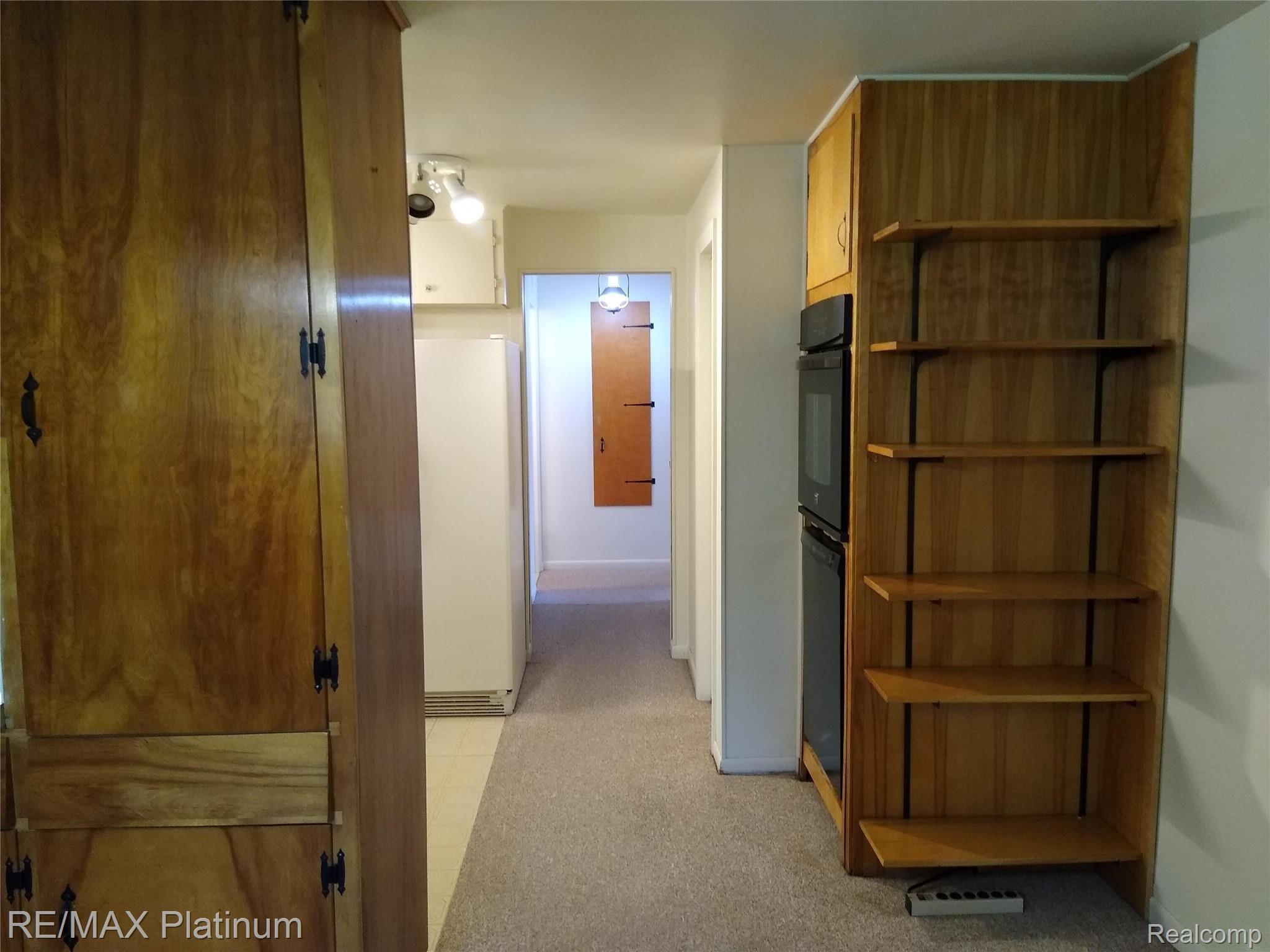 1555 Chilson Road Howell, MI 48843 - Photo 12 of 47 Kitchen and hallway