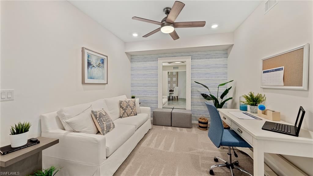 5467 Double Eagle Circle, Unit 3225 Ave Maria, FL 34142 - Photo 8 of 31 a living room with furniture