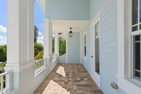 a view of a hallway with windows