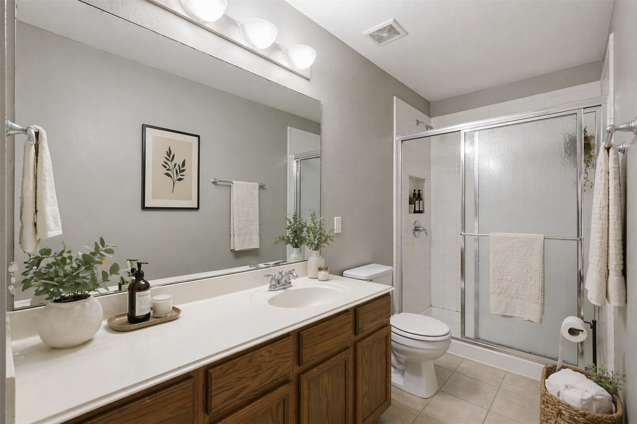 3010 Swift Brook Glen Way Spring, TX 77389 - Photo 12 of 17 a bathroom with a shower sink vanity mirror and toilet