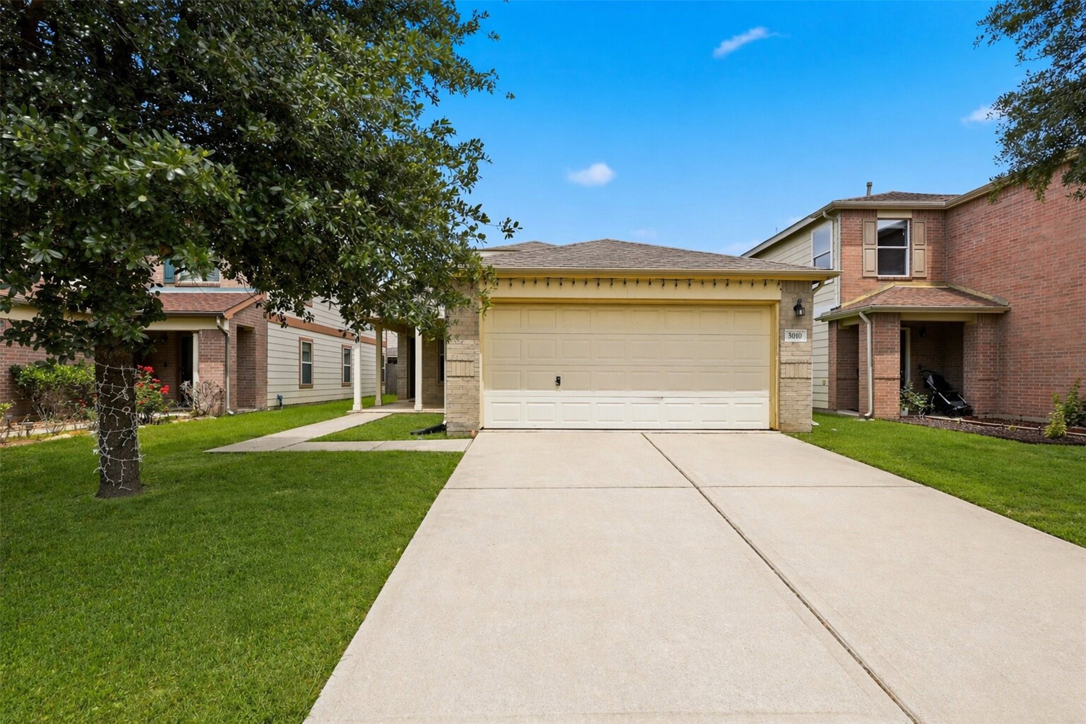 3010 Swift Brook Glen Way Spring, TX 77389 - Photo 2 of 17 front view of a house with a yard
