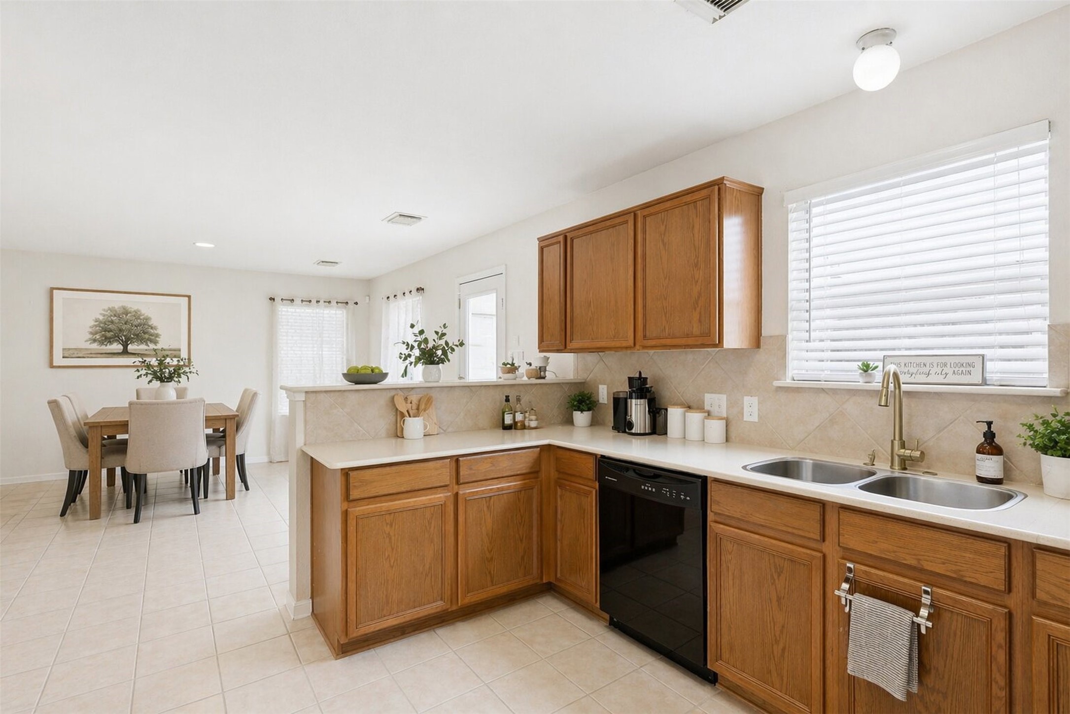 3010 Swift Brook Glen Way Spring, TX 77389 - Photo 7 of 17 a kitchen with a sink and cabinets