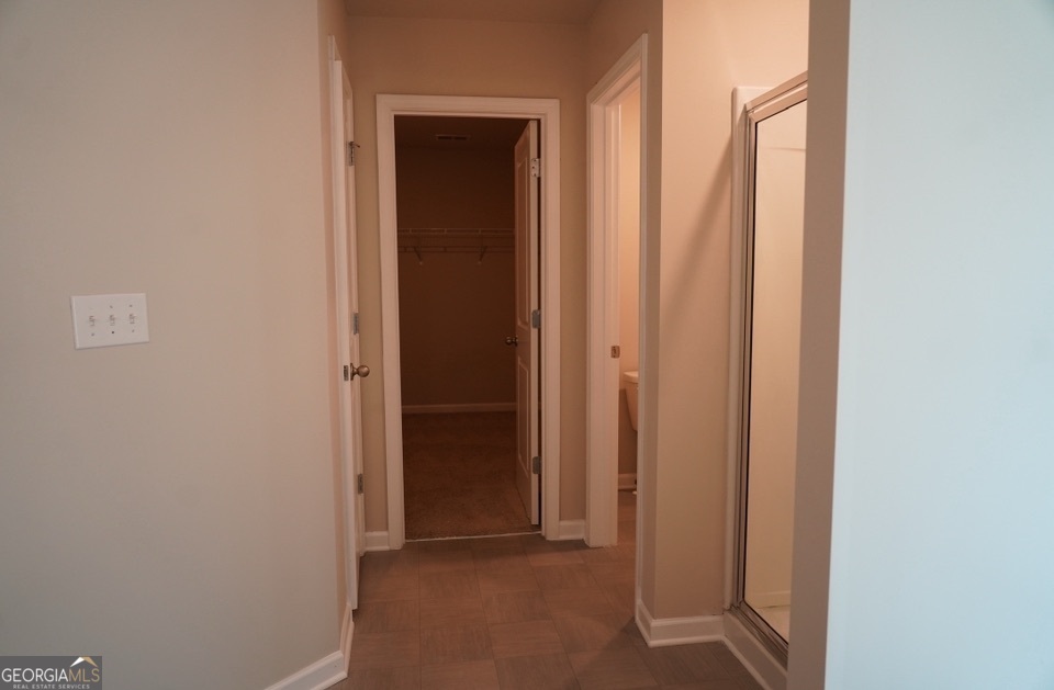 11922 Lovejoy Crossing Way Hampton, GA 30228 - Photo 10 of 15 a view of a bathroom with shower