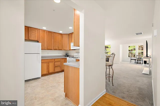 a view of a kitchen cabinets and a sink