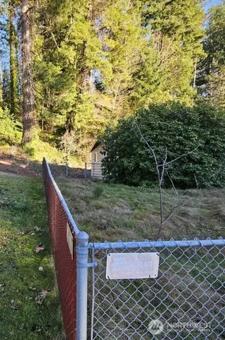 a backyard of a house with lots of green space