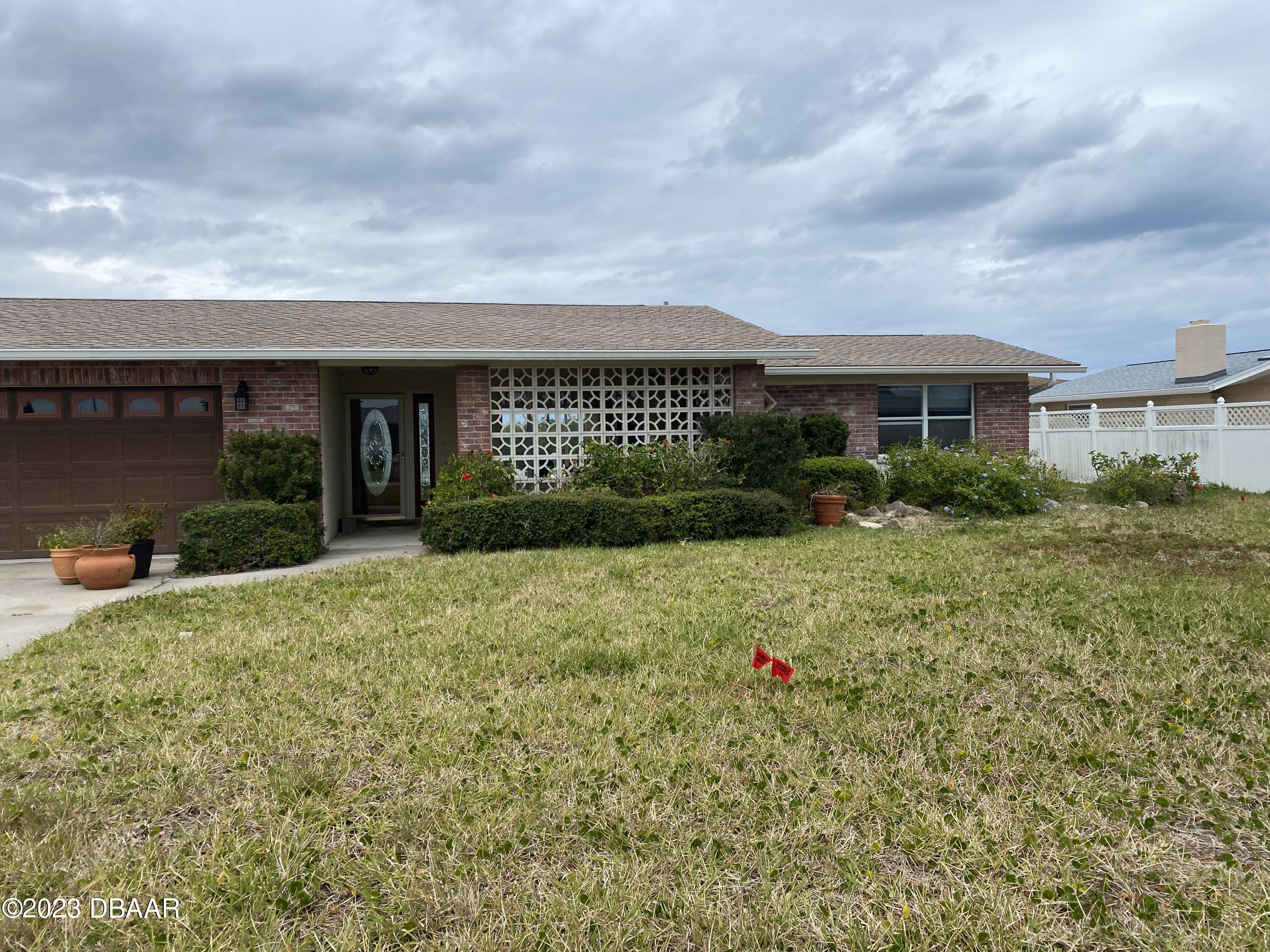 124 Carriage Ponce Inlet, FL 32127 - Photo 1 of 5 FRONT