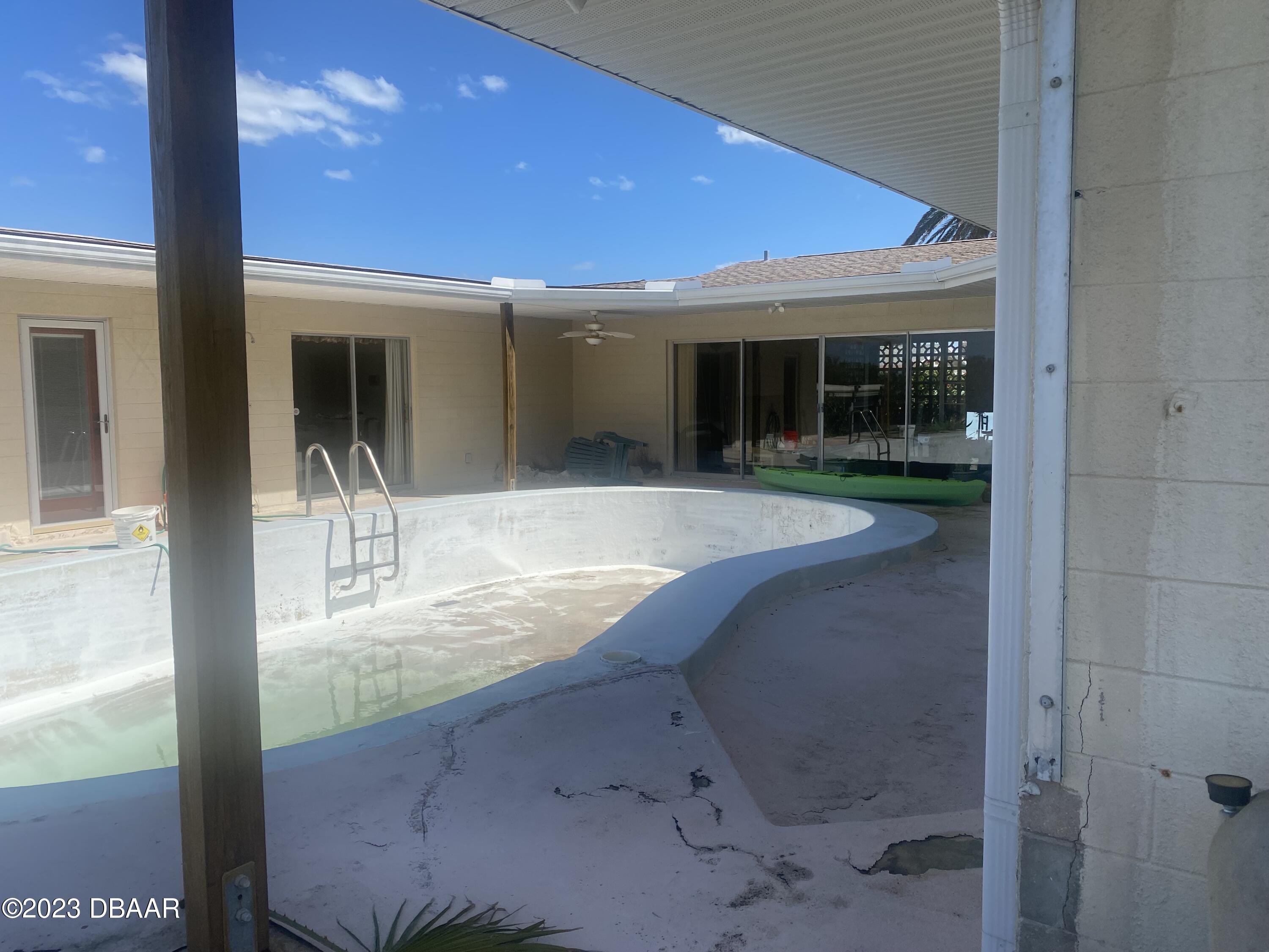 124 Carriage Ponce Inlet, FL 32127 - Photo 2 of 5 BACK PATIO/POOL
