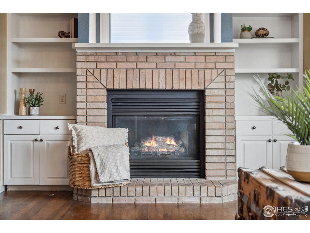 1618 Silvergate Road Fort Collins, CO 80526 - Photo 18 of 37 Fireplace with built in cabinets