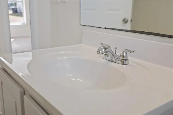 a close view of a faucet a sink