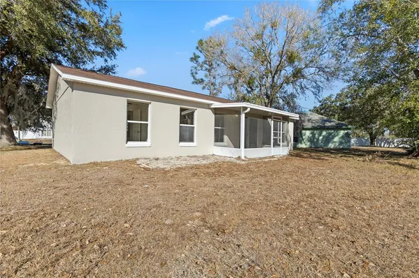 a house with trees in front of it